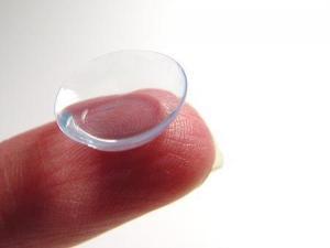 contact lens on finger